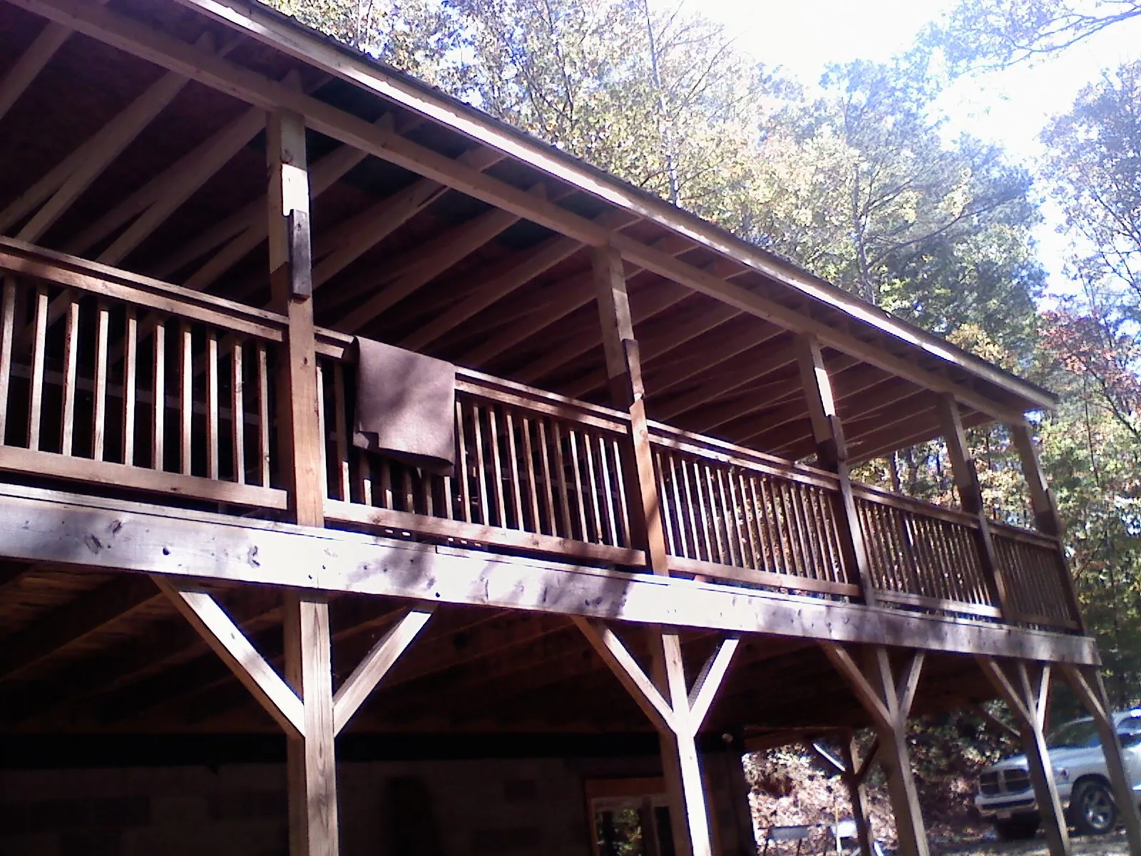 Timber framing under a new elevated porch and deck — Roof Leak Repair in Everett by Roofing Brothers